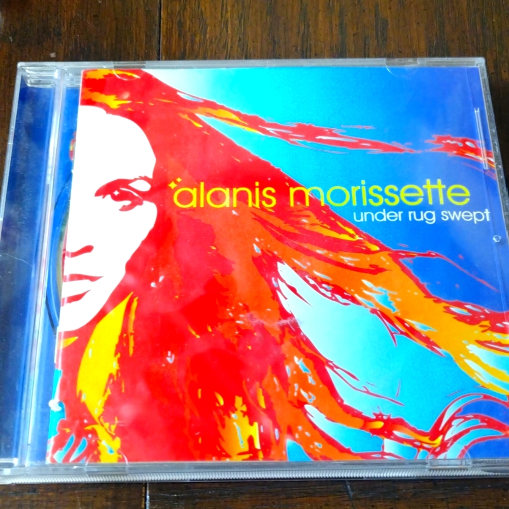 Alanis Morissette under rug swept CD